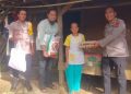 Kapolsek Panimbang Salurkan Bantuan Warga Miskin